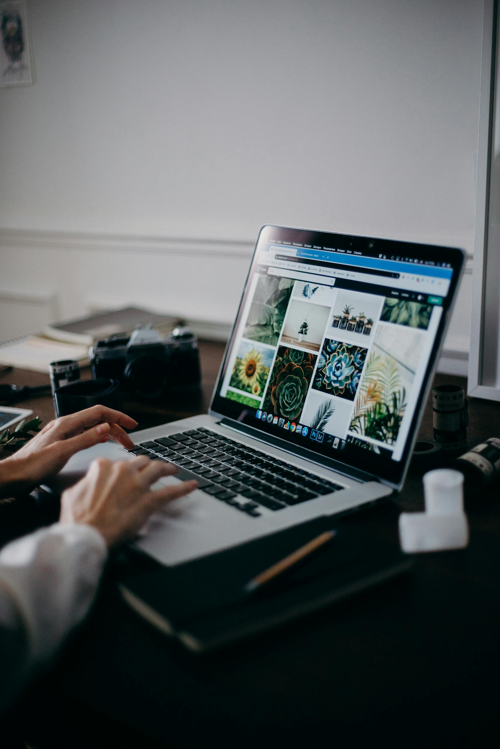 Web designer at CDH WebDesign working on a responsive website design.